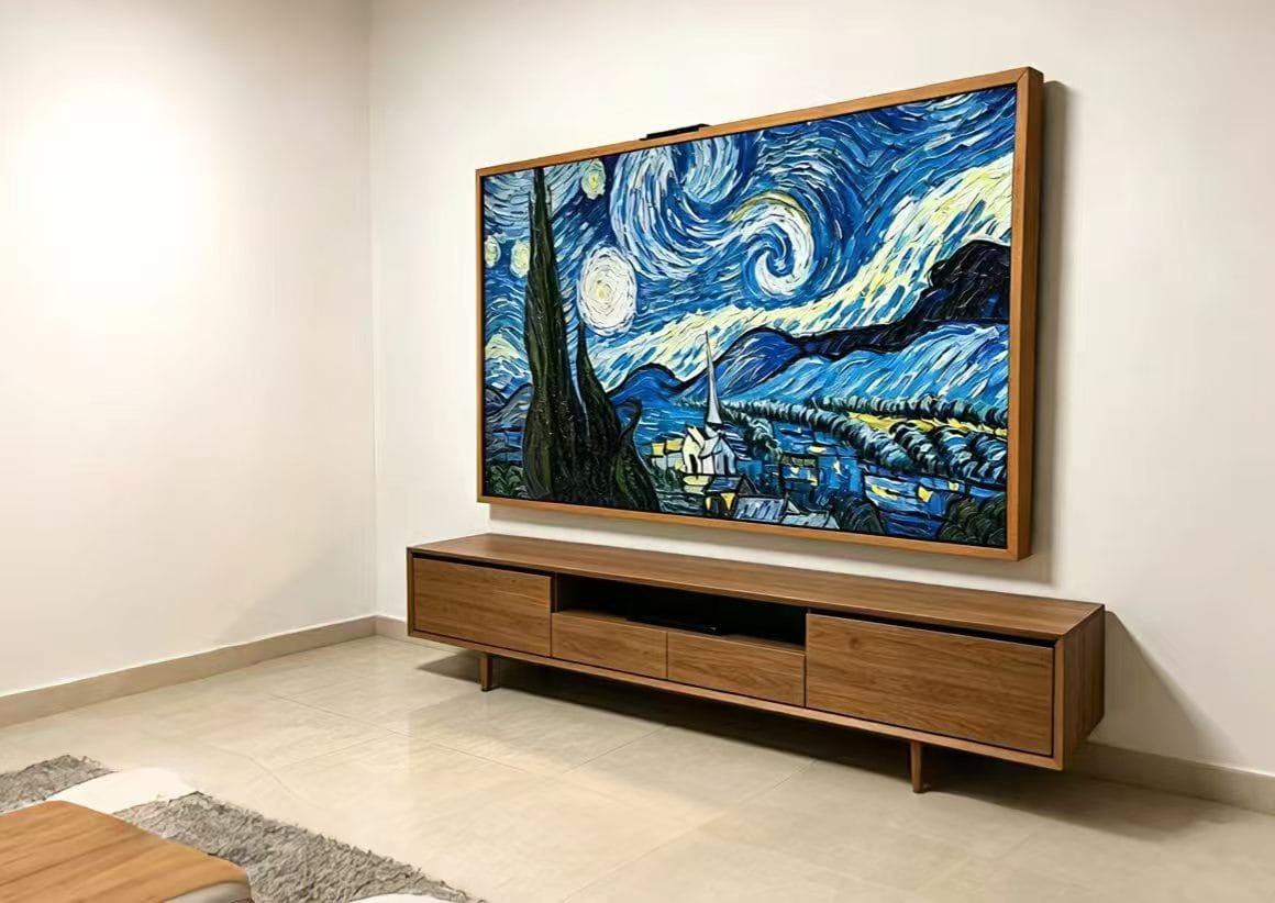 A solid-wood TV surround around a wall-mounted screen